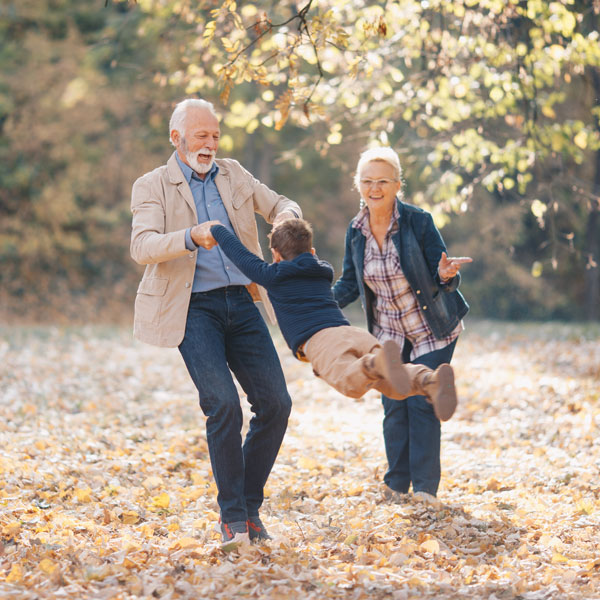 grandparents with grandson outside